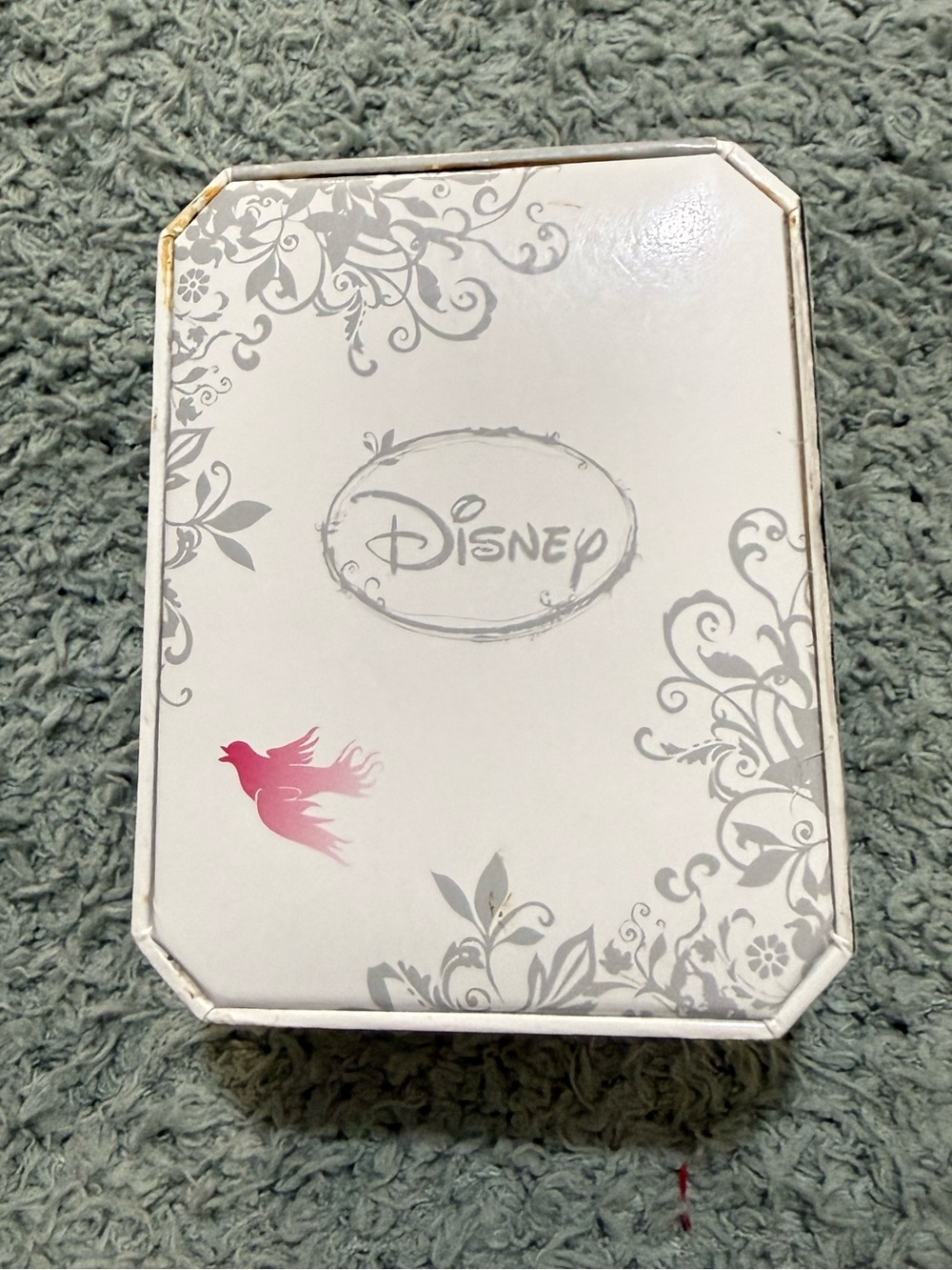 Disney Winnie the Pooh watch features a crystal-bezel dial and dangling charms o